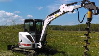 Аренда экскаватора погрузчика с ямобуром в Кронштадт цена от 1569 руб